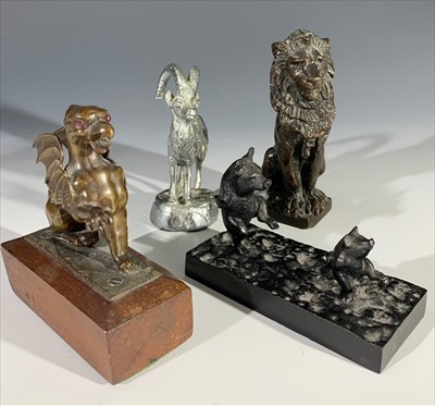 Lot 177 - A bronze lion sejant height 9.5cm, a bronze...