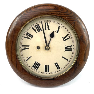 Lot 1701 - A Smiths oak circular fusee wall clock.