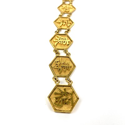 Lot 47 - A 14ct gold Chinese Bracelet.