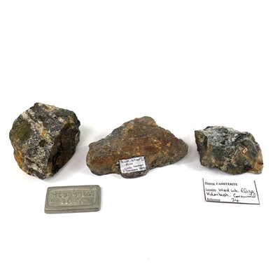 Lot 187 - Three cut cassiterite specimens.