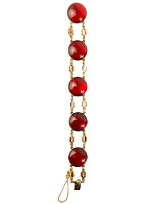 Lot 122 - A Georgian high purity gold (tests 14ct) foil back garnet bracelet.