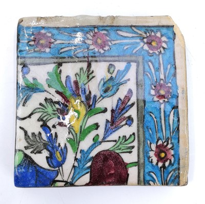 Lot 1019 - Four Persian pottery polychrome tiles, 19th century, Qajar Dynasty.