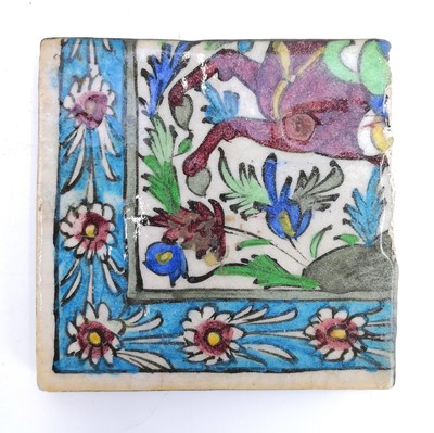 Lot 1019 - Four Persian pottery polychrome tiles, 19th century, Qajar Dynasty.