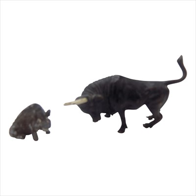 Lot 180 - A bronze model of a bull and a cold painted...