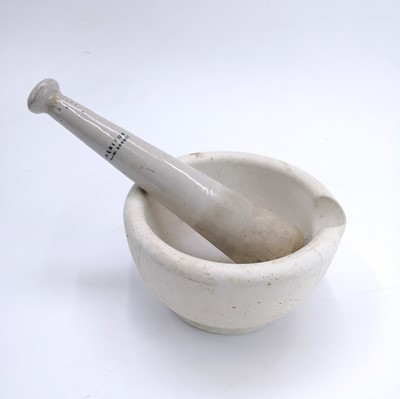 Lot 140 - A mortar and pestle of large proportions.