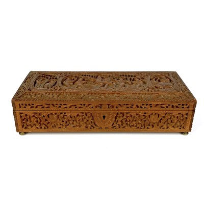 Lot 1011 - An Indian carved sandalwood rectangular box, circa 1900.