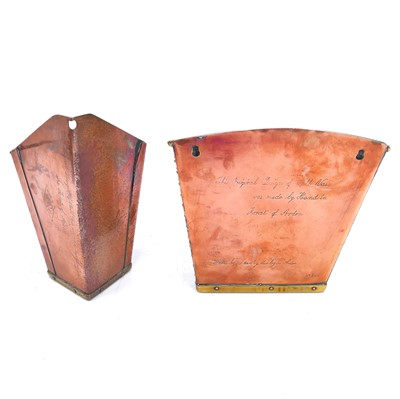 Lot 81 - An Arts and Crafts copper and brass bound wall vase with an inscribed case by N R Hartley.