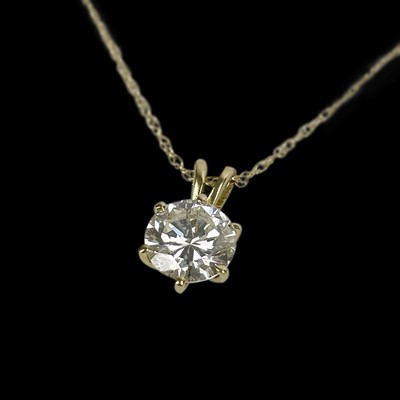 Lot 31 - A remarkable 18ct gold mounted 2.34ct diamond pendant.