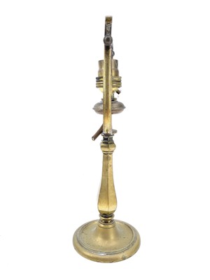 Lot 99 - A ships brass wall mounted gimbal lamp.