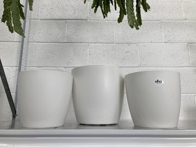 Lot 271 - Three white elho plant pots. The largest pot...