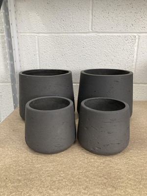 Lot 277 - Four Stratton Tapered Pots in Carbon. Height...