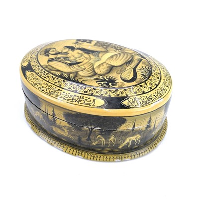 Lot 1015 - A Persian oval lacquered box, mid 20th century.