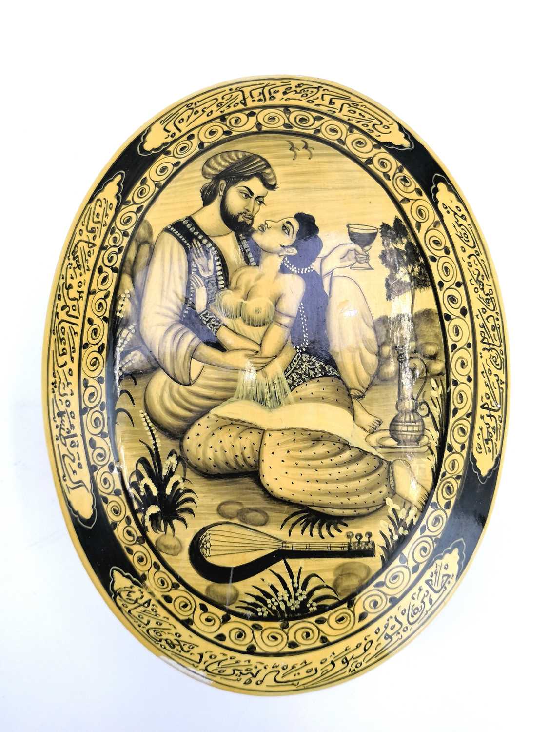 Lot 1015 - A Persian oval lacquered box, mid 20th