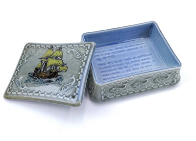 Lot 880 - A Wade Irish Porcelain Guniness trinket box and cover decorated with a full mast ship and whales.