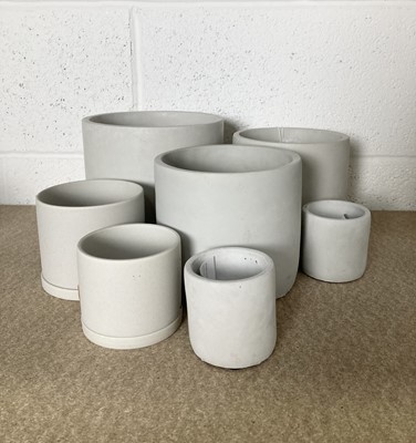 Lot 289 - A collection seven Garden Trading cement pots....