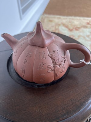 Lot 56 - A Chinese Yixing pottery teapot, 19th century.