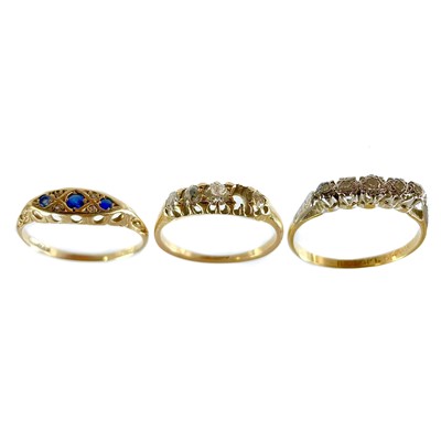 Lot 200 - Two 18ct gold diamond five stone rings.