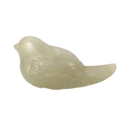 Lot 9 - A Chinese pale jade carved bird, Qing Dynasty.