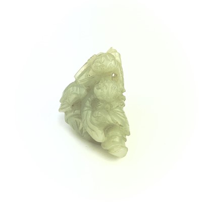 Lot 14 - A Chinese pale jade carving of two boys, Qing Dynasty.
