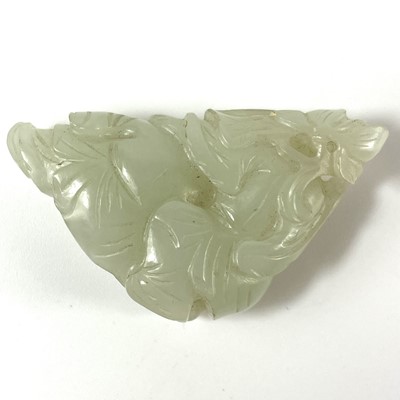 Lot 14 - A Chinese pale jade carving of two boys, Qing Dynasty.