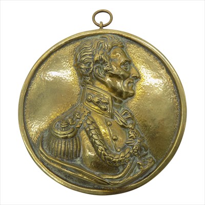 Lot 169 - A 19th century brass relief profile plaque of...