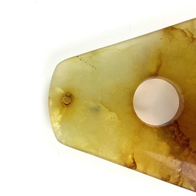 Lot 21 - A Chinese russet jade pendant, Qing Dynasty.