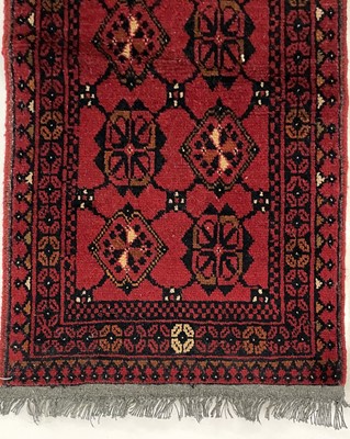 Lot 1253 - Two Afghan rugs.