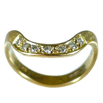 Lot 248 - A modern 18ct hallmarked gold seven stone diamond set ring.