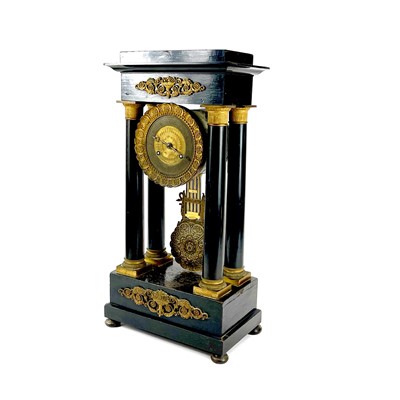 Lot 1709 - A French ebonised and ormolu portico clock.