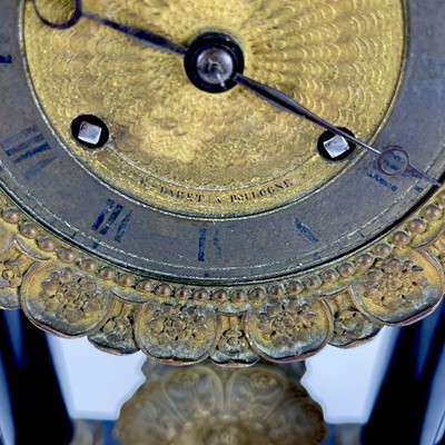 Lot 1709 - A French ebonised and ormolu portico clock.