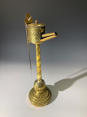 Lot 205 - A brass whale oil lamp, possibly Dutch.