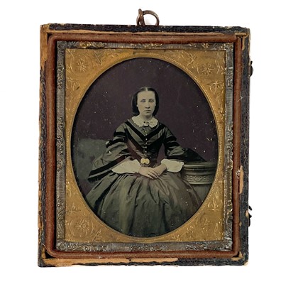Lot 17 - A Victorian tinted Ambrotype portrait photograph by Mr & Mrs Grocott, Manchester.