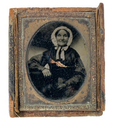 Lot 17 - A Victorian tinted Ambrotype portrait photograph by Mr & Mrs Grocott, Manchester.