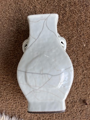Lot 52 - A Chinese celadon crackle-glazed porcelain hu-shaped vase, 19th century.