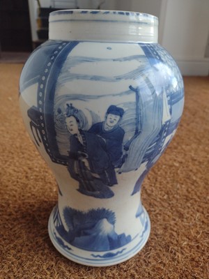 Lot 53 - A Chinese blue and white porcelain baluster vase, 18th century.