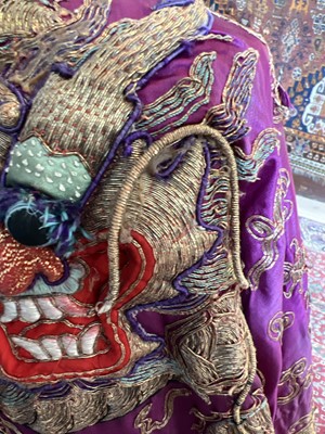 Lot 40 - A large Chinese silk embroidered dragon robe, late 19th century.