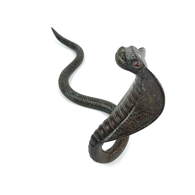 Lot 1023 - An Indian bronze sculpture of a cobra, 19th century.