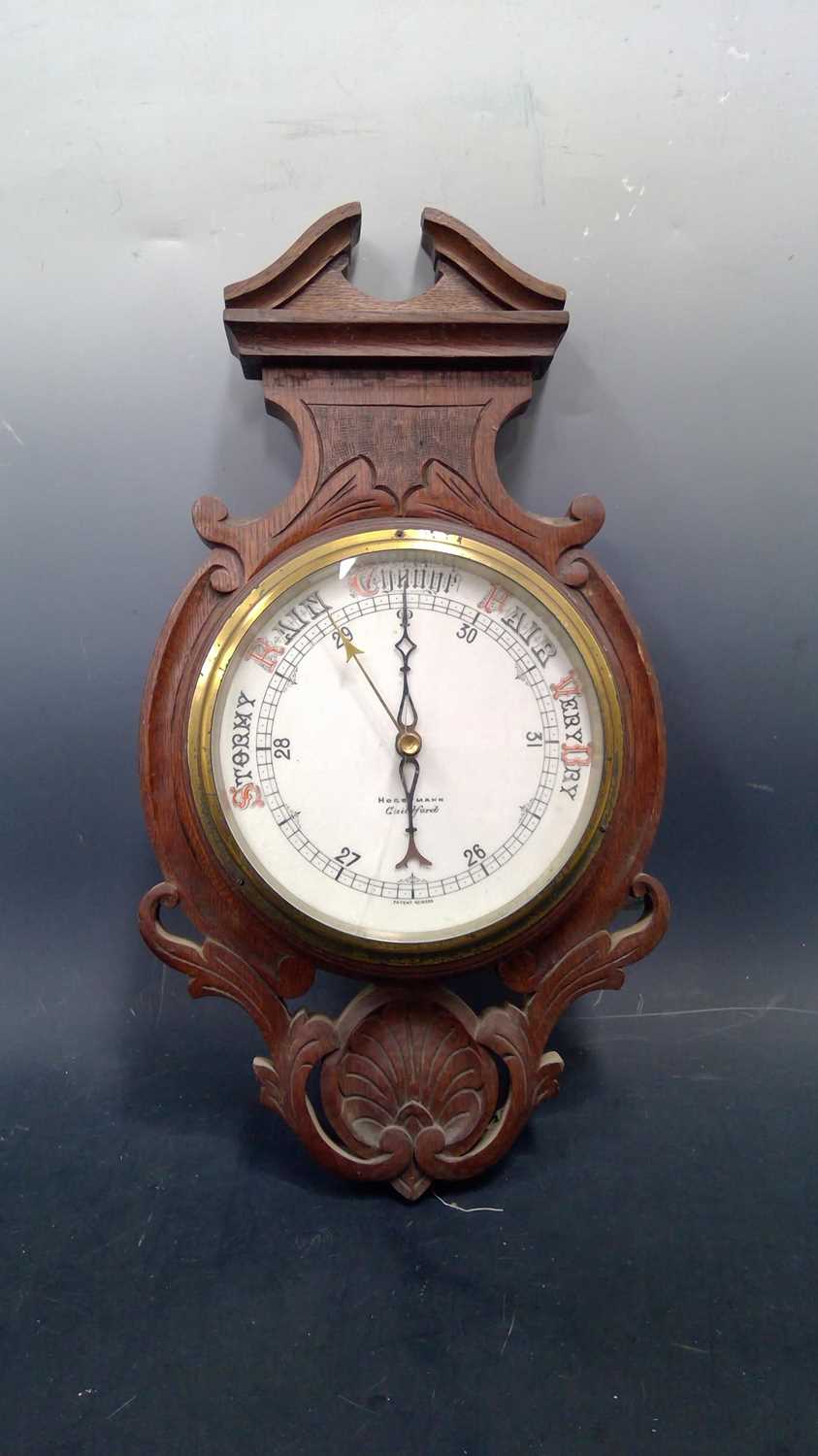 Lot 159 A large wallhanging barometer by Horstmann