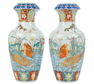 Lot 129 - A pair of Japanese Imari porcelain baluster vases, 19th century.