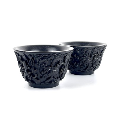 Lot 77 - A pair of Chinese carved Zitan wood bowls.