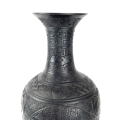 Lot 91 - A large rare Chinese carved black porcelain vase, Qing Dynasty.