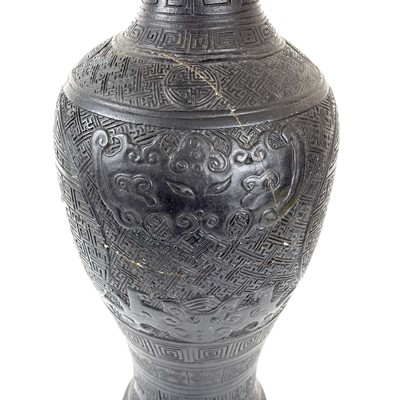 Lot 91 - A large rare Chinese carved black porcelain vase, Qing Dynasty.