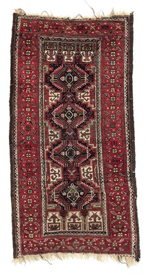 Lot 1276 - A Belouch rug, circa 1920.