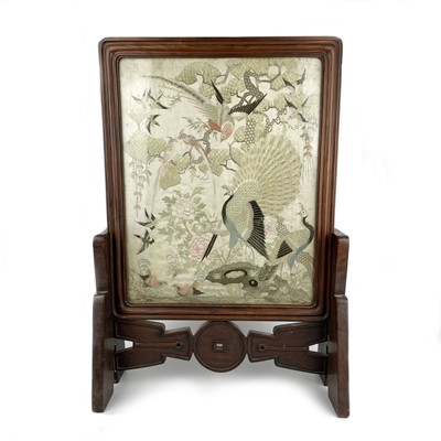 Lot 236 - A Chinese hardwood framed silk embroidered table screen, 19th century.