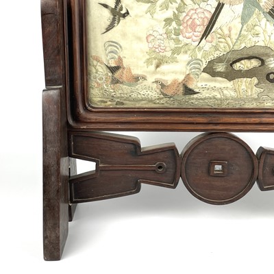 Lot 236 - A Chinese hardwood framed silk embroidered table screen, 19th century.