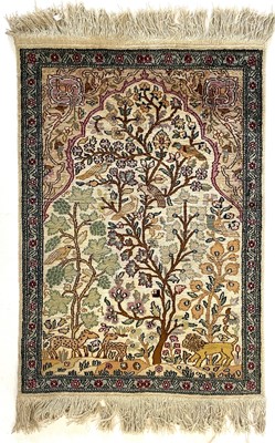 Lot 1283 - A Persian art silk prayer rug, mid 20th century.