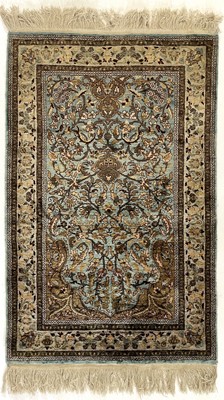 Lot 1284 - A Persian art silk prayer rug, mid 20th century.