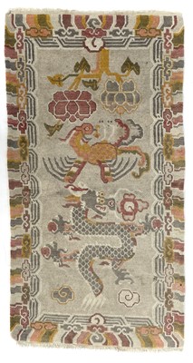 Lot 1286 - A Chinese rug.