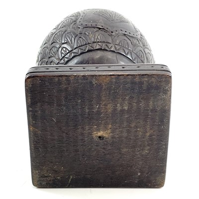 Lot 1 - A carved coconut box and cover.