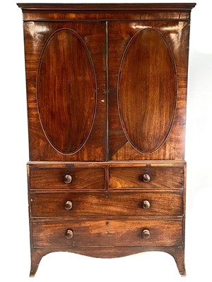 Lot 1836 - A George III mahogany linen press.